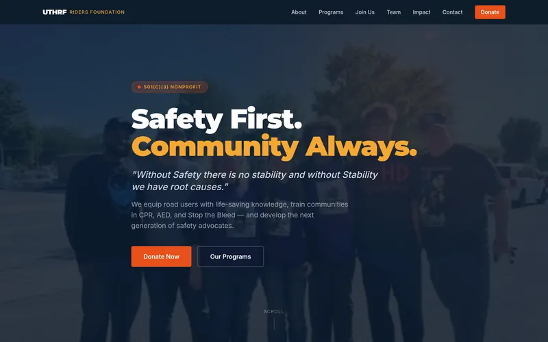 Homepage of the Under The Helmet Riders Foundation website: “Safety First. Community Always.” over a group photo, with Donate Now and Our Programs buttons.